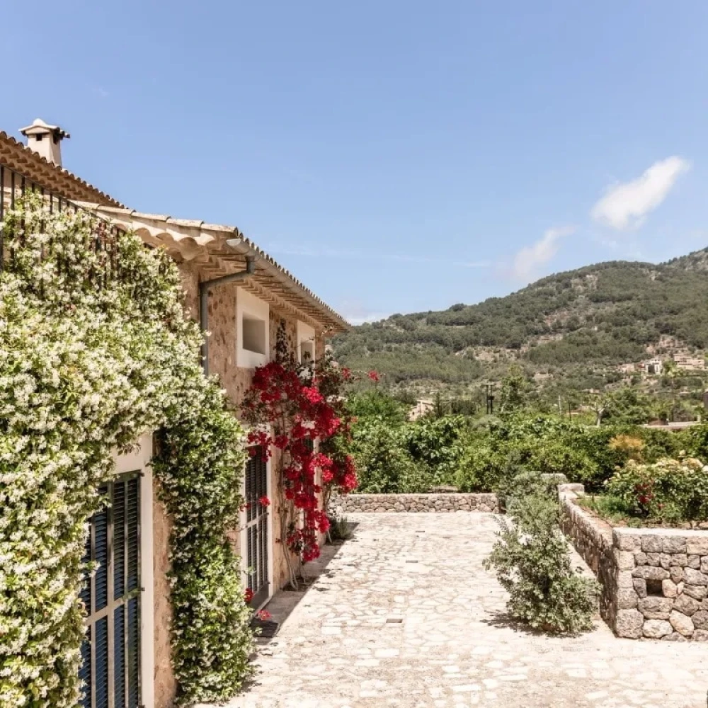 Front of villa with a cobble path