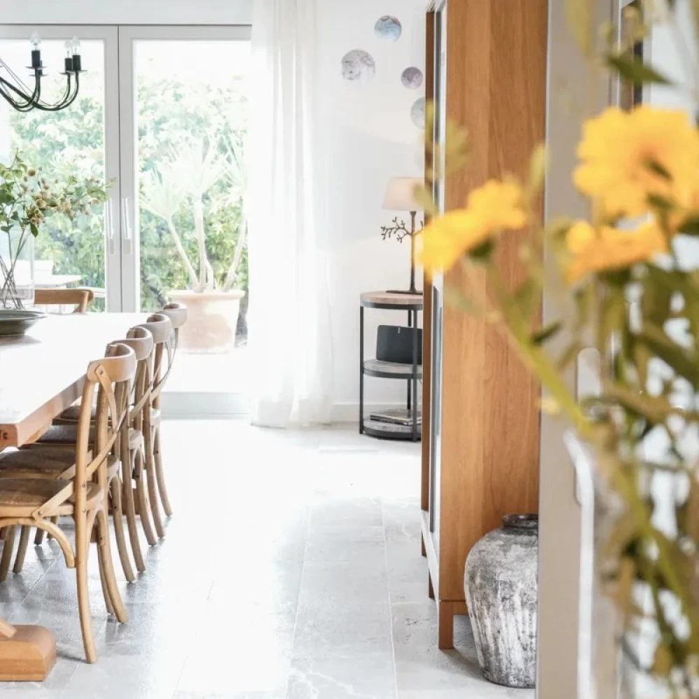 Dinning room table with yellow flowers